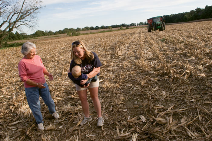 Joanna Carraway and her son, Preston, play with her grandmother Euva Carraway on their farm in Murray, Kentucky. Joanna also works at an office in town but dreams of someday returning to the farm full-time. Photo by Andy Olsen